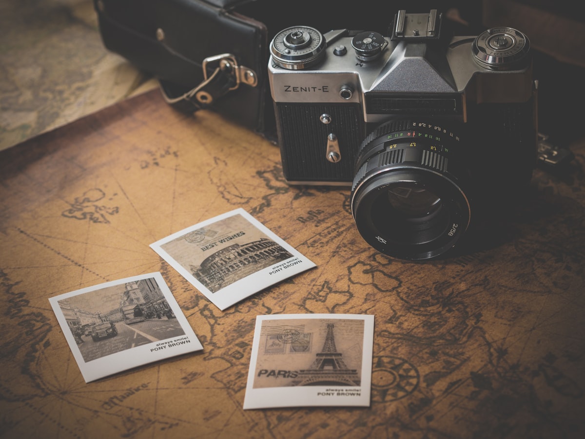 Camera and contact prints on a table