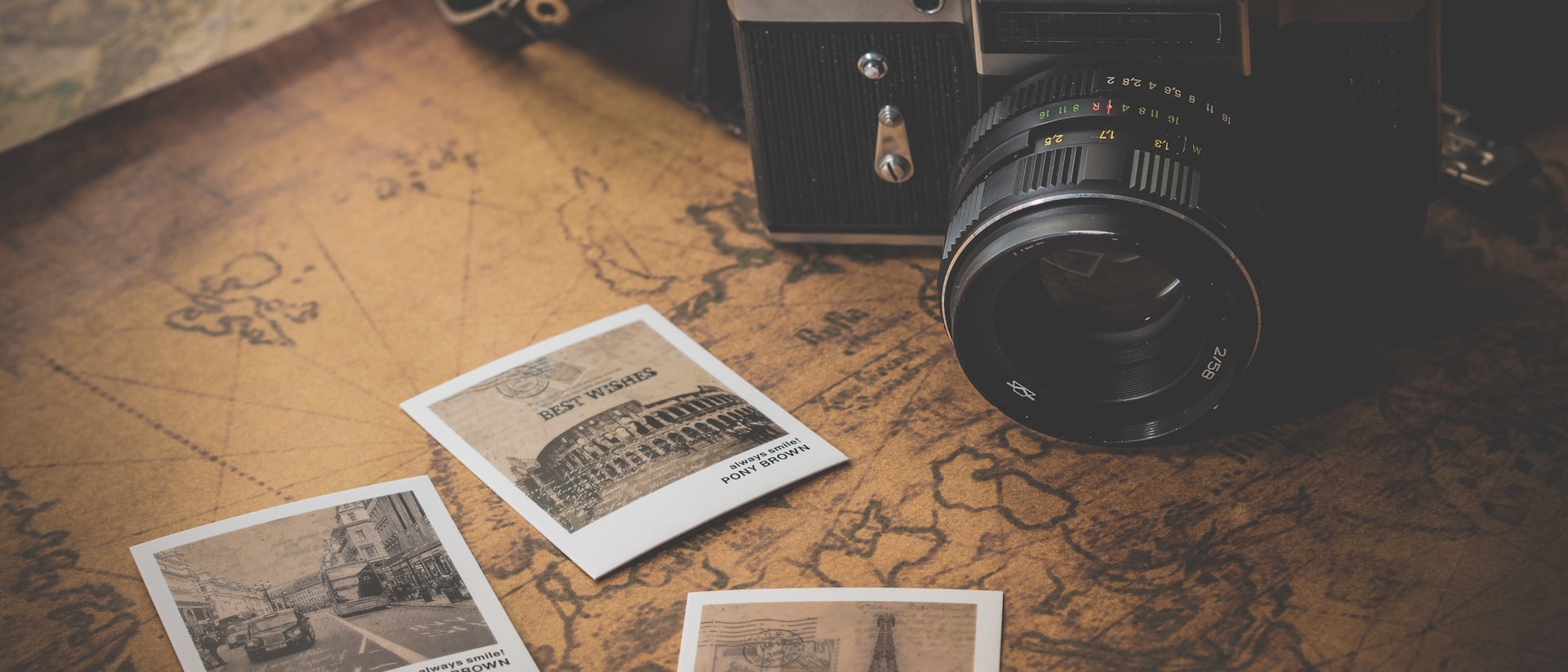 Camera and contact prints on a table